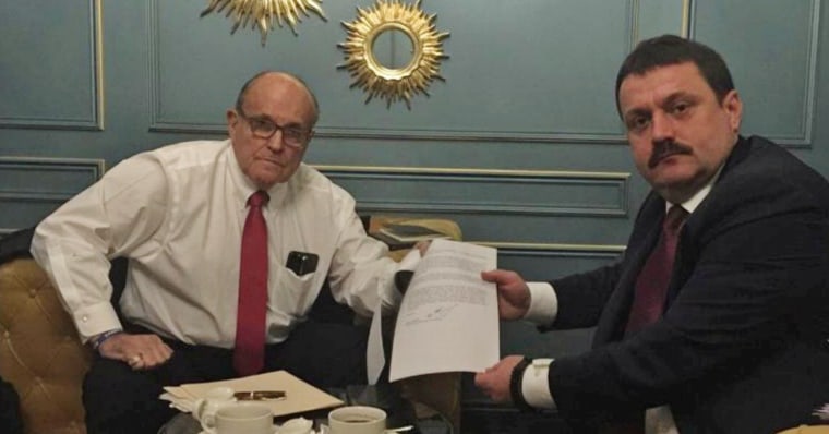 Image: Ukrainian lawmaker Derkach attends a meeting with U.S. lawyer Giuliani in Kiev