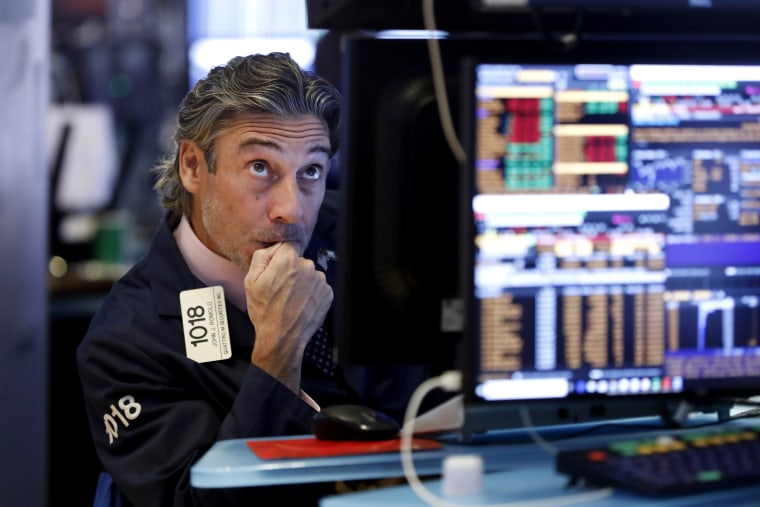 Image: A trader works the floor of the New York Stock Exchange on Aug. 14, 2019.