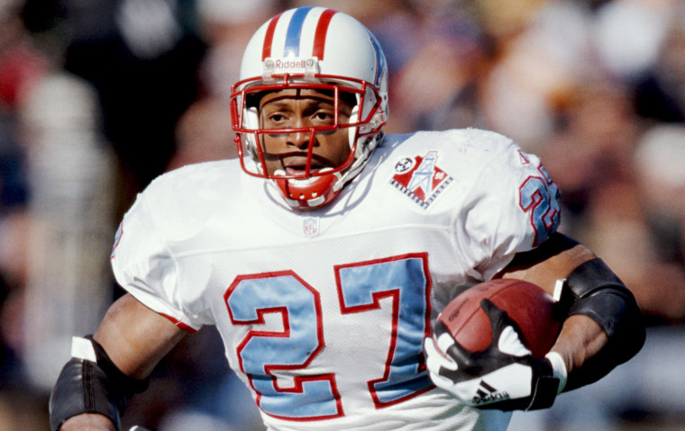 Image: Eddie George, running back for the Tennessee Titans, runs during a game against the Minnesota Vikings on Dec. 26, 1998.