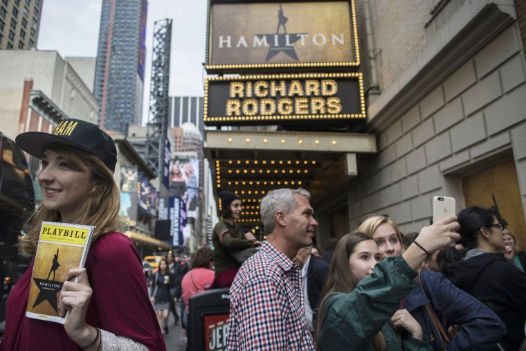 Image: Tourists In Times Square Ahead Of Theater Ticket Sales Figures