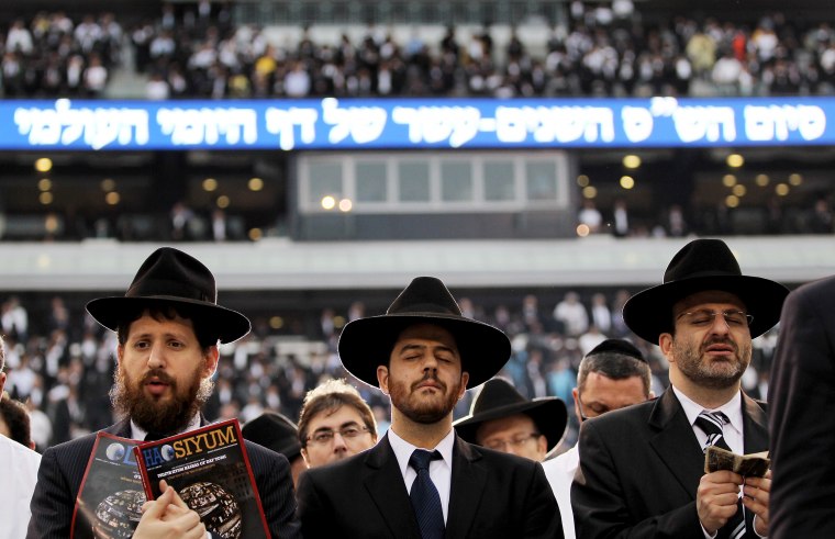 Image: Orthodox Jews gather to study the entire Talmud text at MetLife Stadium in East Rutherford, N.J., on Aug. 1, 2012.