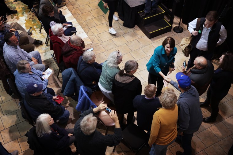 Image: Sen. Amy Klobuchar greets supporters at the Fairfield Arts and Convention Center in Iowa on Dec. 20, 2019.