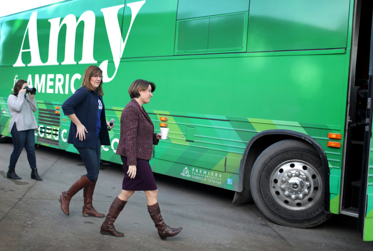 Image: Sen. Amy Klobuchar boards her campaign bus after a stop in Humboldt, Iowa, on Dec. 27, 2019.
