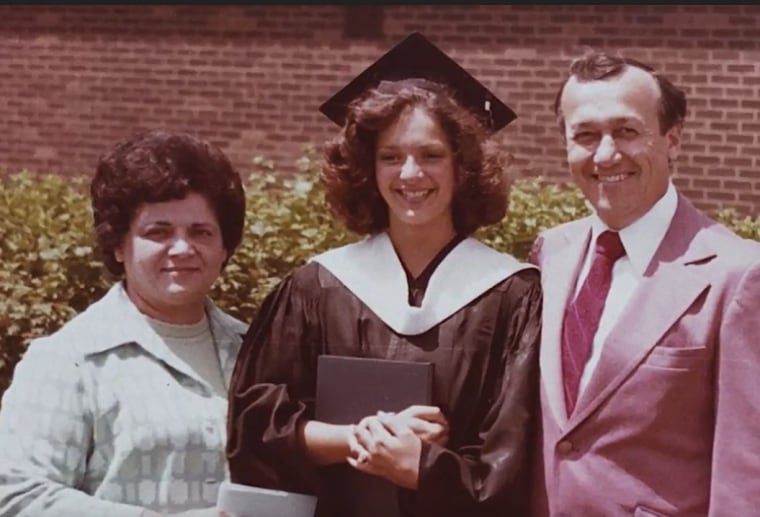 Ellen Latham with her parents.