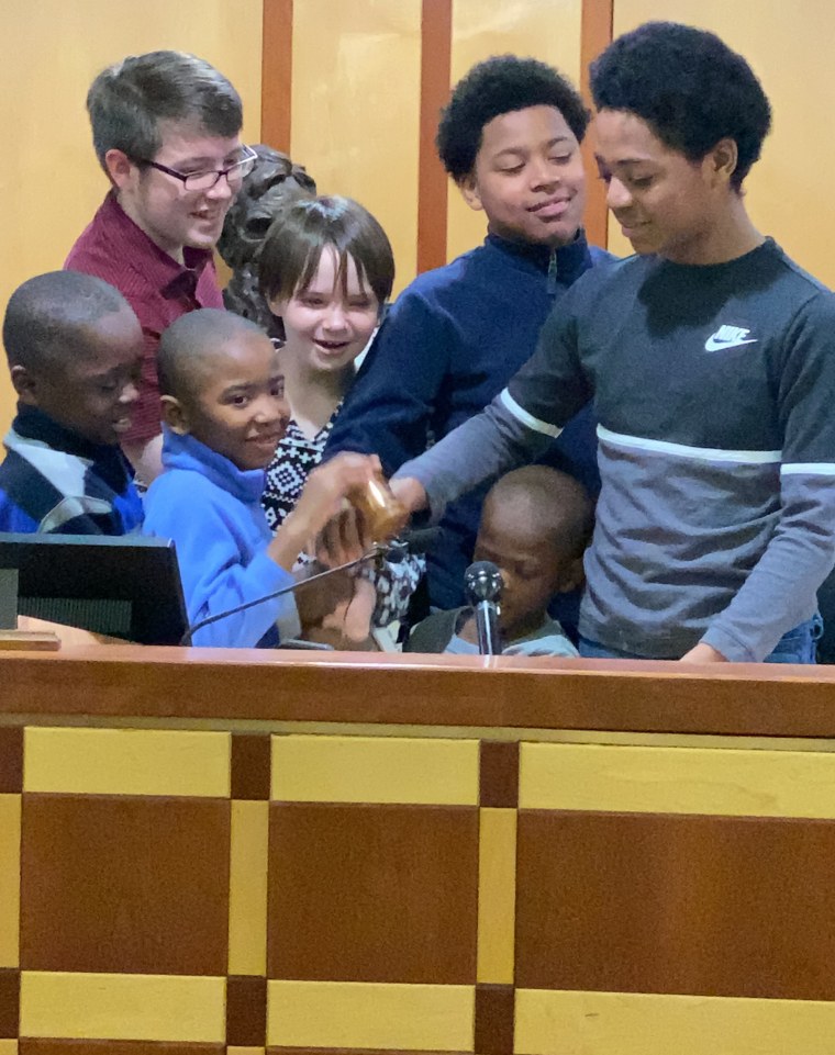 Jessica Benzakein's kids got to bang the gavel in the courtroom.