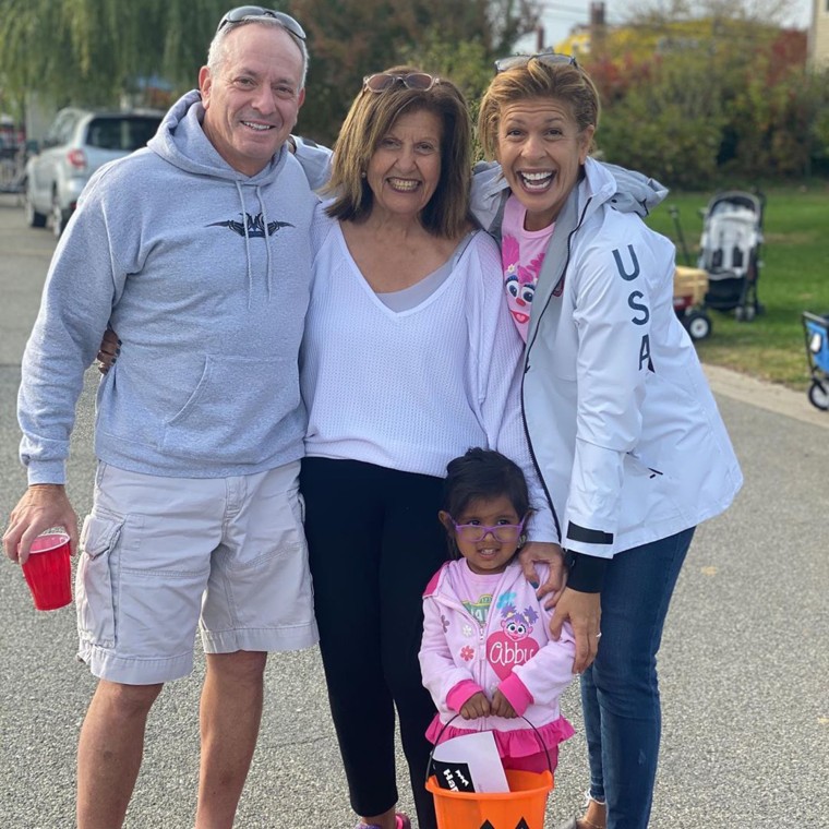 Hoda's fiancé, Joel Schiffman, poses with her mother, Sami, and their daughter Haley Joy. 