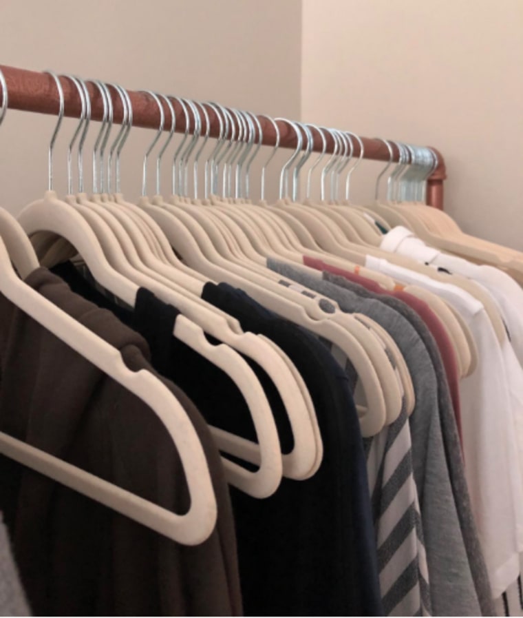 These velvet hangers keep clothes secure and save so much space