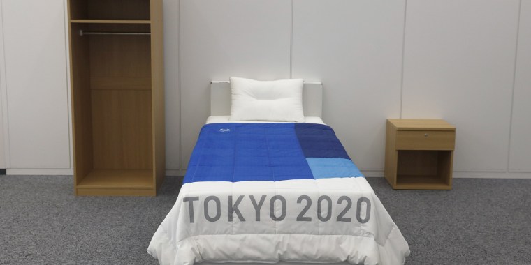 A set of bedroom furniture, including a cardboard bed, for the Tokyo 2020 Olympic and Paralympic Villages is on display in Tokyo.