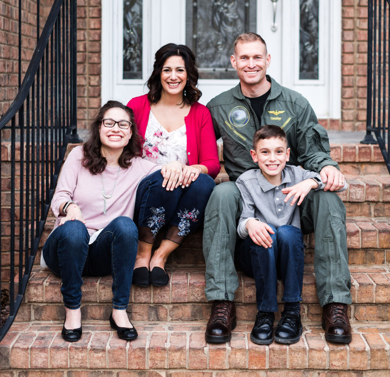 Military spouse Michelle Norman with her husband and children