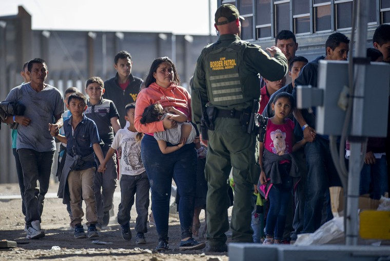 Image: Migrants are loaded onto a bus by Border Patrol agents in El Paso, Texas, on June 1, 2019.