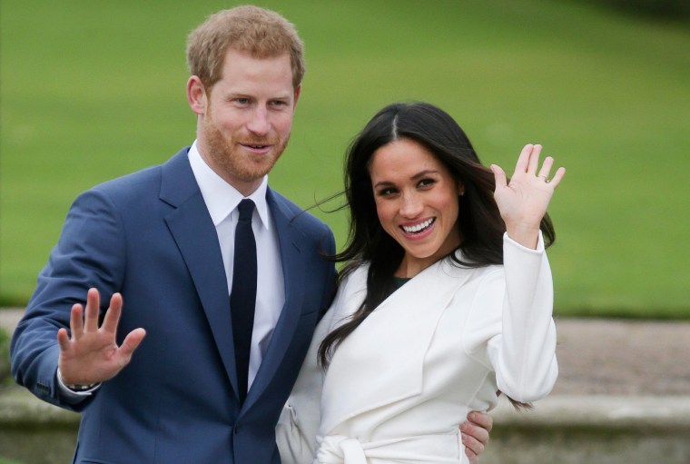 Image: Britain's Prince Harry and his fiancee Meghan Markle pose for a photograph in the Sunken Garden at Kensington Palace in west London, following the announcement of their engagement