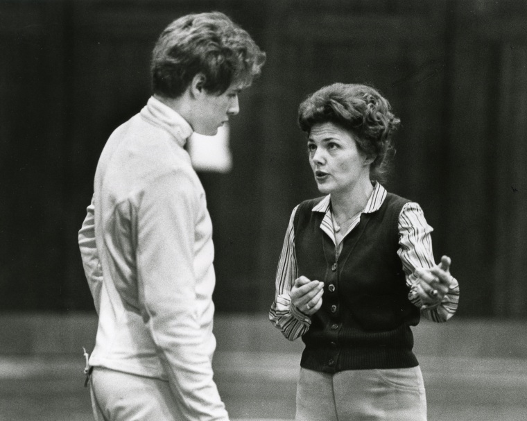OSU fencing coach Charlotte Remenyik gives a coaching tip to a fencing student in 1981.
