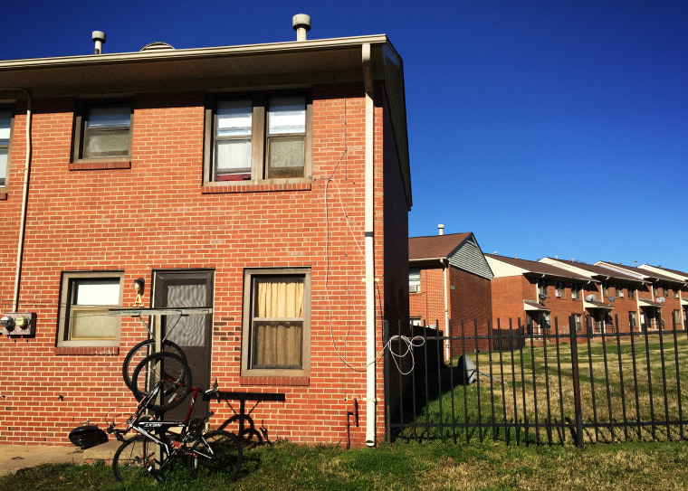 Image: More than 250 of the 325 families who live at the predominantly black McDougald Terrace housing complex, including the Pettifords, have been evacuated.