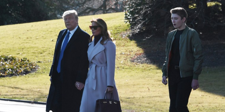 Image: President Donald Trump, wife Melania and son Barron leave for the weekend.