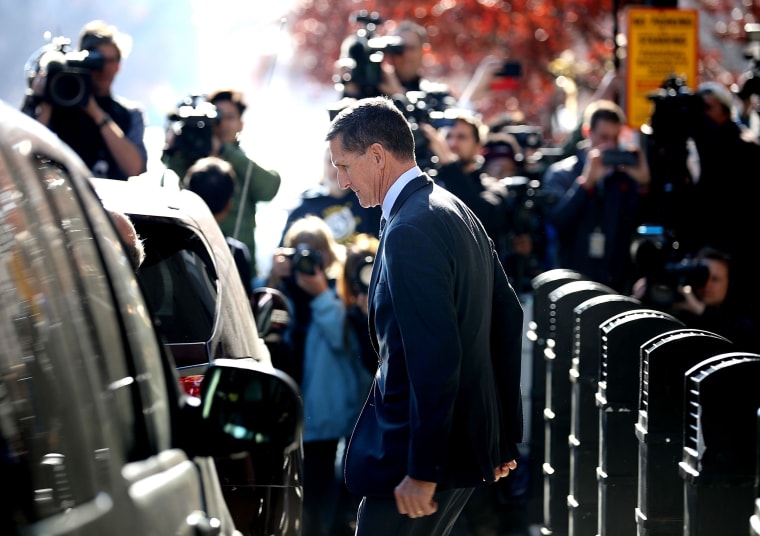 Image: Michael Flynn leaves federal court after he pleaded guilty to lying to the FBI