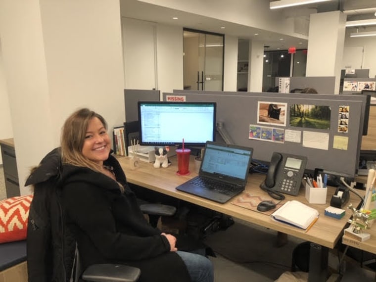 Page's redesigned desk — with a healthy dose of cats.