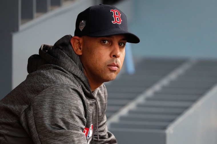 Image: Alex Cora #20 of the Boston Red Sox sits in the dugout prior to Game Five of the 2018 World Series against the Los Angeles Dodgers at Dodger Stadium.