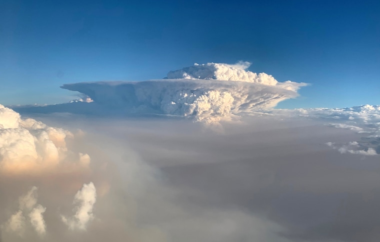 Image: Pyrocumulonimbus cloud formation is seen from a plane as bushfires continue in New South Wales