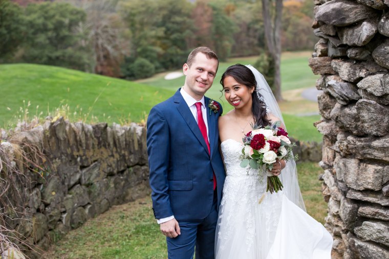 Sam and Tiffany Adams on their wedding day in Garrison, New York.