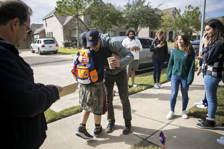 Beto O'Rourke greets a boy in Katy, Texas