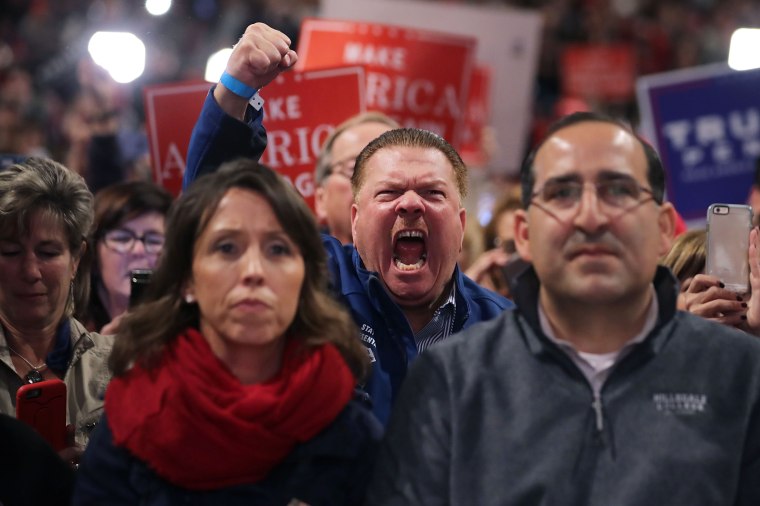 Rep. Pete Lucido, R-Shelby Twp., cheers for Republican presidential nominee Donald Trump during a campaign rally in Sterling Heights