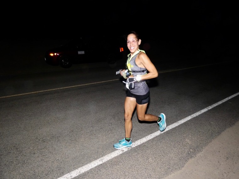 Caryn Lubetsky running through the night during the Badwater 135-mile race in California's Death Valley.