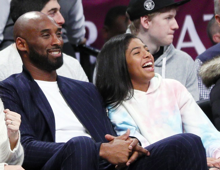 Kobe Bryant and daughter Gianna sit courtside to watch Los Angeles Lakers  game at Staples Center