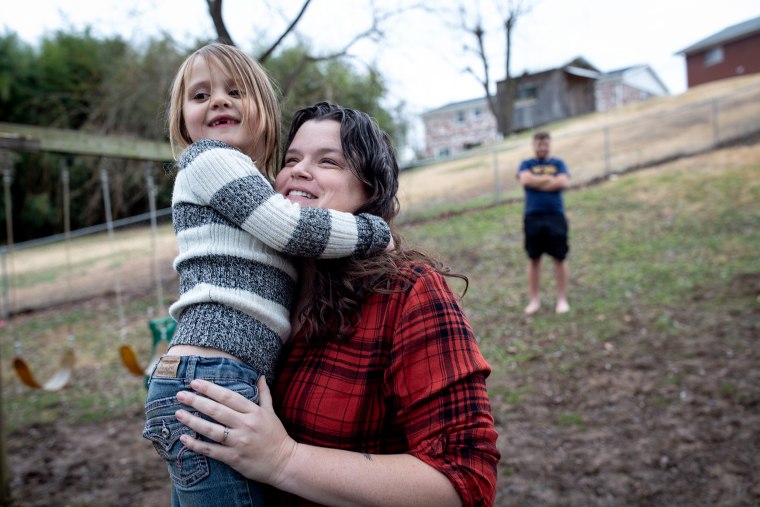 Nikki Snuffer, 35, hugs her daughter Harlow, 6 in Charleston. Snuffer and her wife Louisa adopted Harlow and seven other children impacted by the opioid epidemic. With slightly less than 4,000 licensed foster families, state officials are desperate to recruit families like the Snuffers.