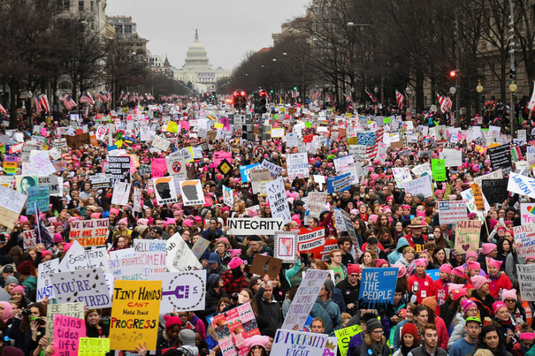Image: Hundreds of thousands march down Pennsylvania Avenue during the Women's March in Washington