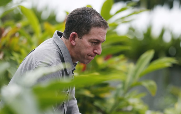 Glenn Greenwald, the blogger and journalist who broke the U.S. NSA surveillance scandal, reacts during an exclusive interview with Reuters in Rio de Janeiro