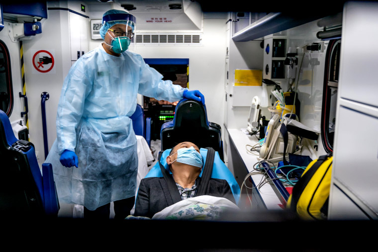 Image: A patient is transferred by ambulance to the Infectious Disease Center in Hong Kong on Jan. 22, 2020. Countries including Hong Kong, the United States, Thailand, Japan, Taiwan and South Korea have reported cases of the coronavirus.