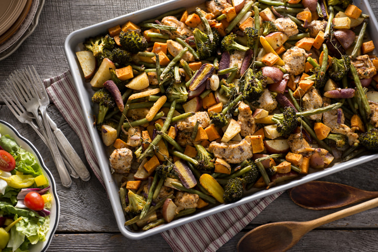 Image: Chicken Sheet Pan Dinner with Broccoli, Red Potatoes, Green Beans, Sweet Potatoes, Rainbow Carrots, Onion and Thyme.