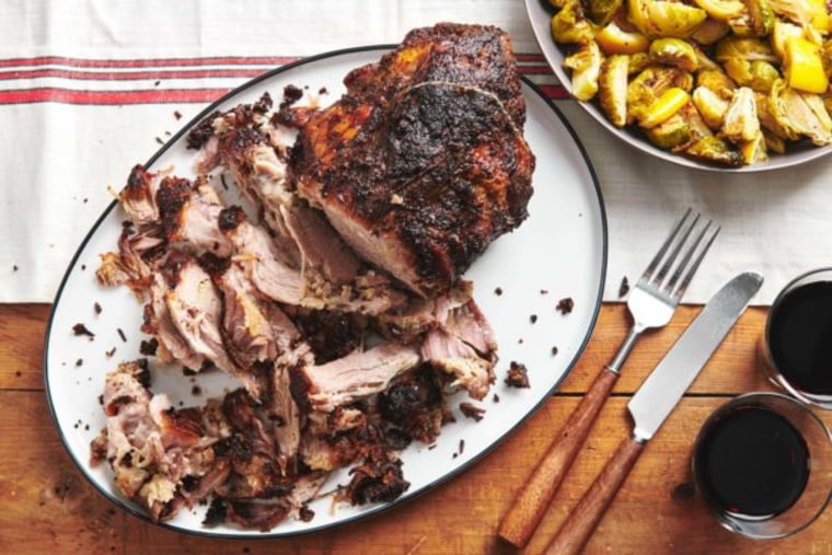 A super tender slow cooked marinated pork shoulder is a go-to dish for casual entertaining for a crowd.