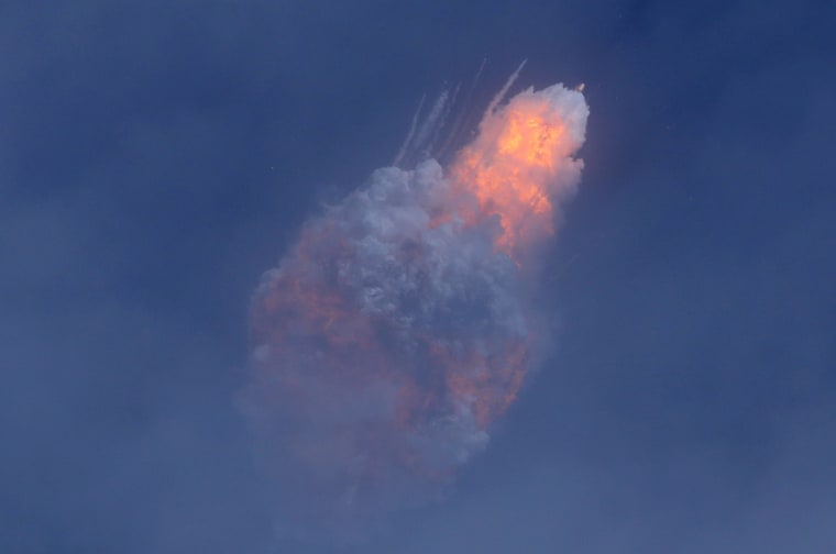 Image: A SpaceX Falcon 9 rocket engine self-destructs after jettisoning the Crew Dragon astronaut capsule during an in-flight abort test after lift of from the Kennedy Space Center in Cape Canaveral