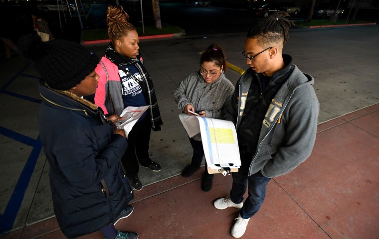 Image: Volunteers walk the streets of Long Beach for the 2020 homeless count