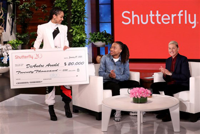 Grammy Award-winning artist Alicia Keys showed her support by surprising DeAndre Arnold, and together, Ellen and Alicia give him a check for $20,000 to put towards college, courtesy of Shutterfly.