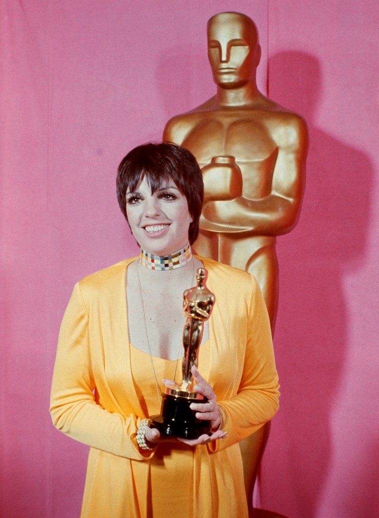 Liza Minneli Holds Her Oscar, Smiling
