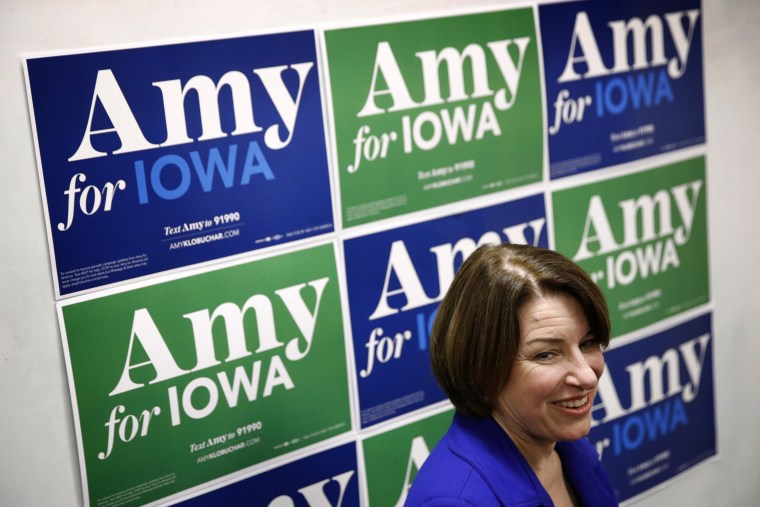 Image: Sen. Amy Klobuchar, D-Minn. visits with attendees at a campaign event in Des Moines, Iowa, on Jan. 19, 2020.