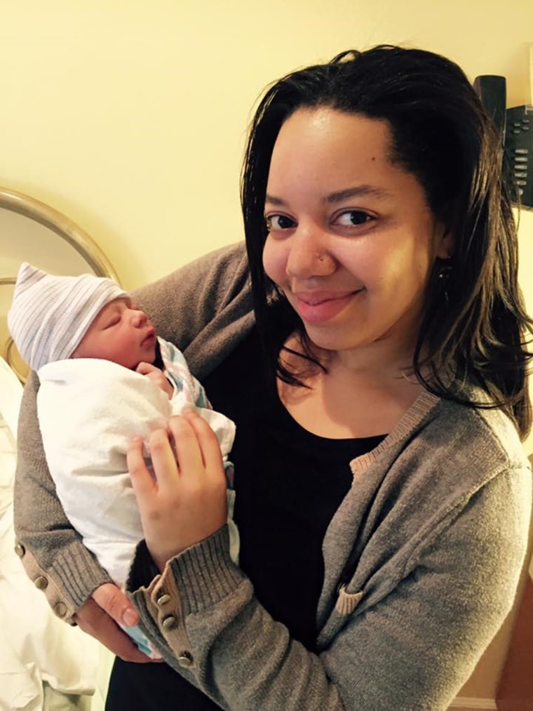 Nelson with one of the newborns she helped to deliver. 