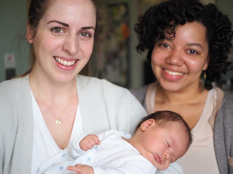 Autumn Nelson (right) with one of the many babies she's helped bring into the world. 