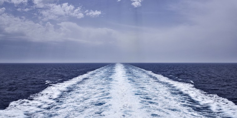 Cruise ship track with calm sea and clear sky