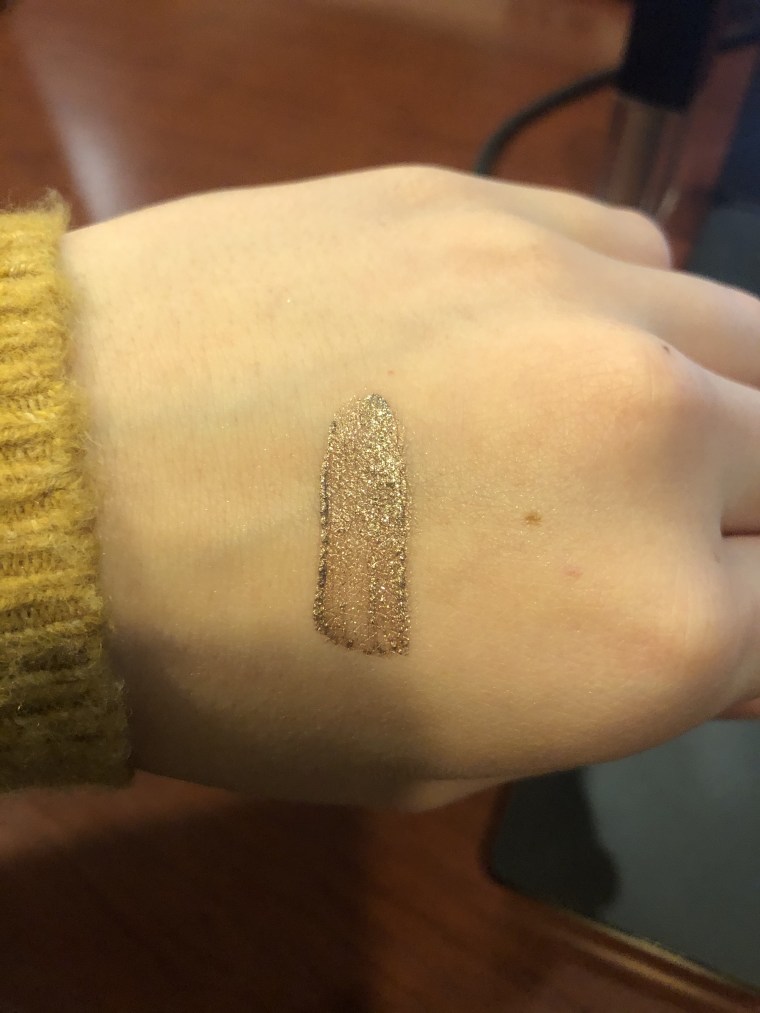 I used the Flashing Lights shade in the Covergirl Exhibitionist liquid shadow.