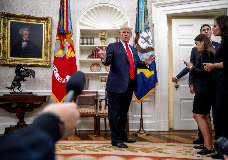 Image: President Donald Trump takes questions in the Oval Office on Sept. 30, 2019.