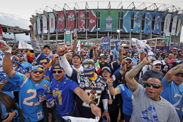 Fans cheer before an NFL game between the Los Angeles Chargers and the Kansas City Chiefs on Nov. 18, 2019, in Mexico City.