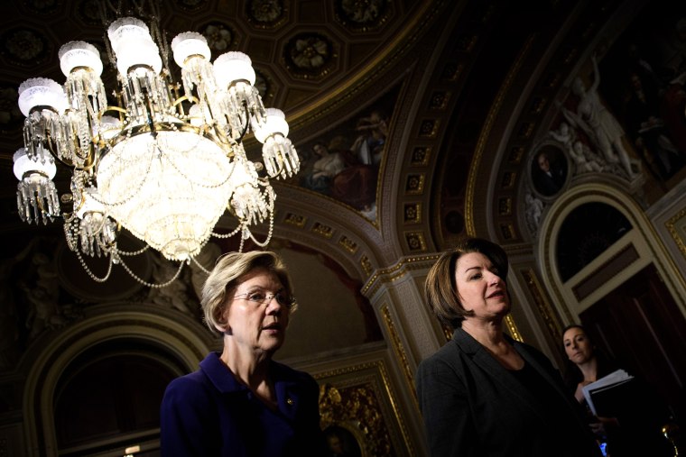 Image: Sen. Elizabeth Warren, D-Mass., and Sen. Amy Klobuchar, D-Minn., arrive to the impeachment trial of President Donald Trump at the Capitol on Jan. 31, 2020.