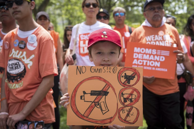 Moms Demand Action holds a rally in Brooklyn for stricter gun laws in June 2019.  