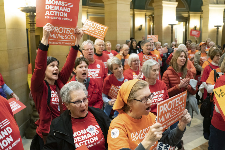 Members of Moms Demand Action rally in the Minnesota state Capitol Rotunda in St. Paul on April 29, 2019.