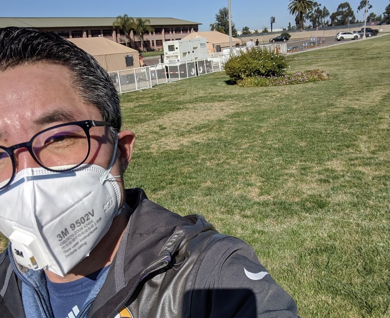 Yu Lin Yin, wears a face mask while in quarantine at the Marine Corps Air Station in Miramar, California. The Minneapolis resident arrived on a flight from Wuhan, in San Diego, on Feb. 6.