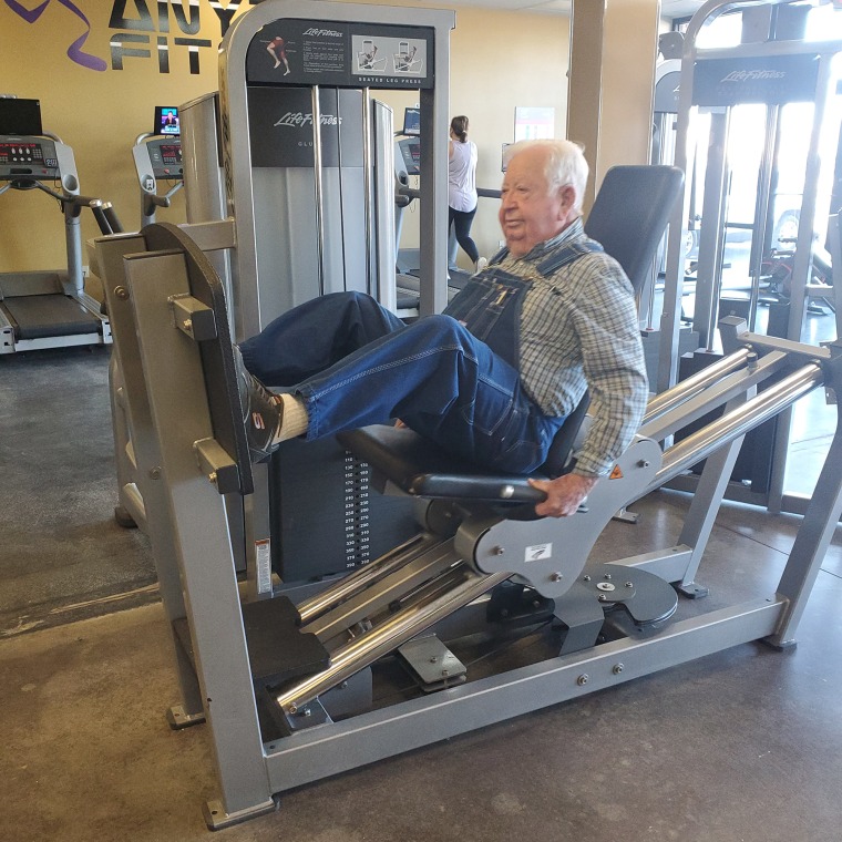 Once Lloyd Black built up his stamina on the treadmill he started weight lifting. Now, he shows some of the other senior members how to use them. 
