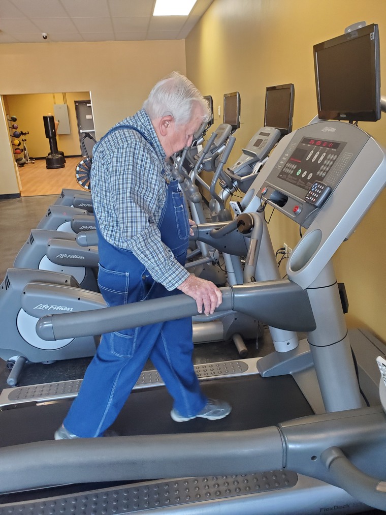 It was hard for Lloyd Black to understand how to turn the treadmill on but he lets general manager Ashley Seaman get it working for him and he just "jumps on." 